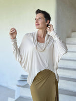 women's natural lightweight rayon jersey cowl neck cream loose fit top with thumbholes #color_cream
