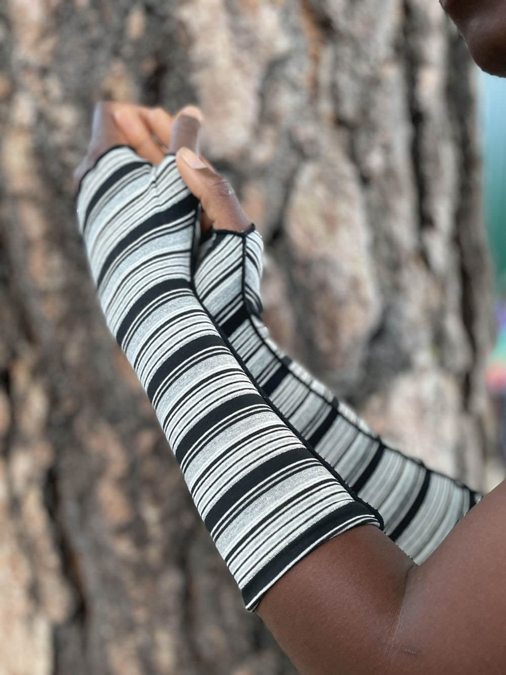 women's plant based rayon jersey stretchy black and grey striped fingerless gloves #color_black-white-grey