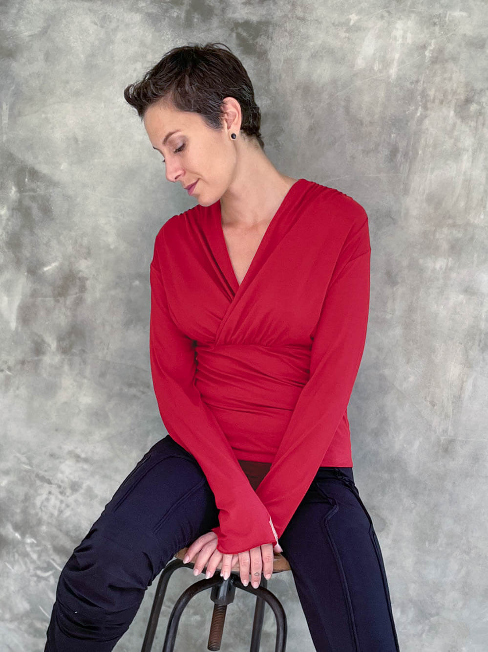 caraucci plant-based rayon stretch jersey red long sleeve cross over neckline top #color_red