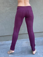 women's bamboo spandex purple pants with raised stitch details and 2 zipper pockets #color_jam