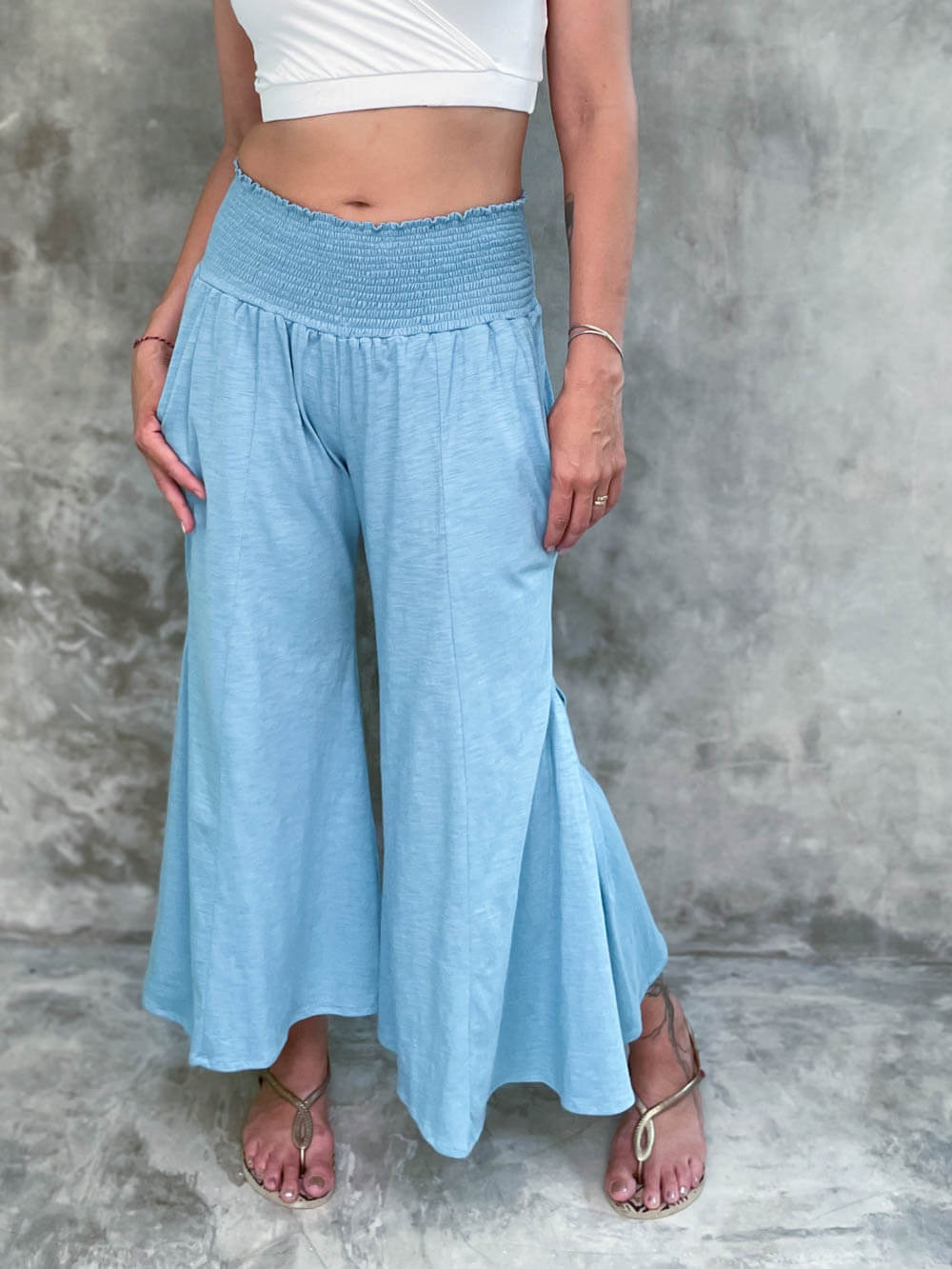 caraucci aquamarine blue cotton cropped pocket flare pants with smocked stretchy waistband #color_aqua