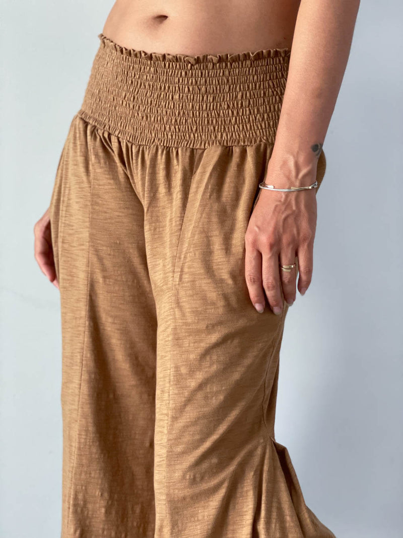 caraucci golden brown cotton cropped pocket flare pants with smocked stretchy waistband #color_camel