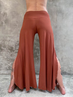 women's natural rayon jersey stretchy burnt orange slit flow pants with elastic waistband #color_copperwomen's natural rayon jersey stretchy burnt orange slit flow pants with elastic waistband #color_copper