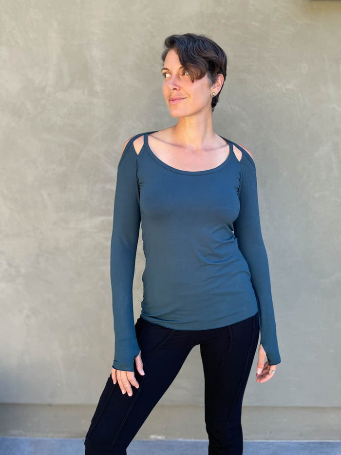 women's plant based stretchy rayon jersey long sleeve peekaboo shoulder teal blue top with thumbholes #color_teal