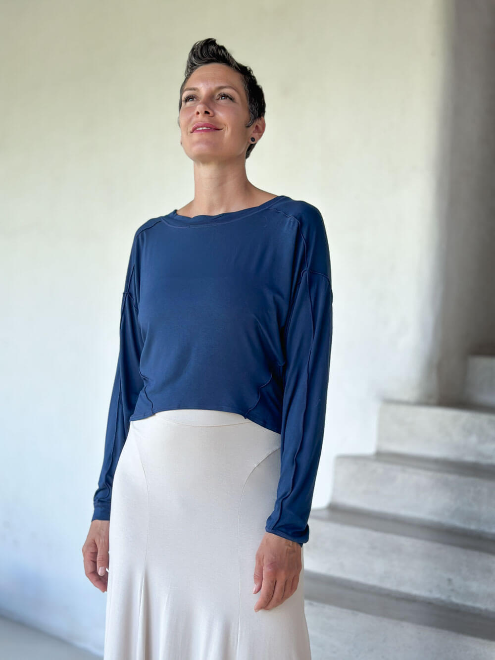 caraucci lightweight plant-based-rayon jersey navy blue reversible long sleeve knot front shrug top #color_navy