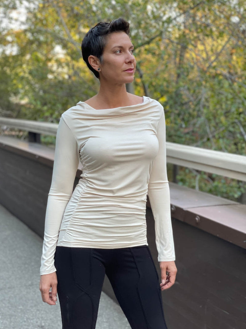 women's plant based rayon jersey long sleeve cream top with slight cowl neck and side ruching #color_winter-white