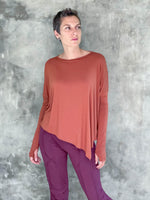 caraucci plant-based rayon jersey rust asymmetrical hem oversized long sleeve top with thumbholes #color_copper