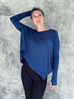 caraucci plant-based rayon jersey navy blue asymmetrical hem oversized long sleeve top with thumbholes #color_navy