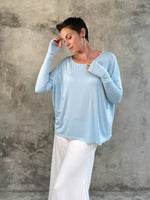 women's plant-based sky blue relaxed fit jersey long sleeve top #color_canal-blue