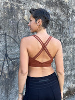 caraucci stretchy full coverage burnt orange yoga bra top with criss cross back straps #color_copper