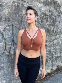 caraucci stretchy full coverage burnt orange yoga bra top with criss cross back straps #color_copper