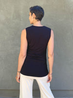 women's plant based rayon jersey sleeveless top with criss cross front detail #color_black