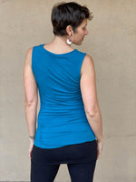 women's plant based rayon jersey bright blue top with ruching on sides and slight cowl neck #color_cosmo