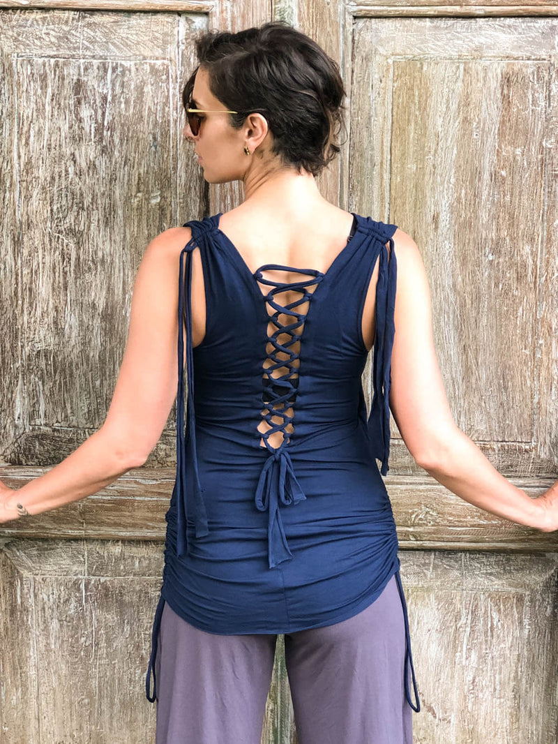 women's plant-based stretchy rayon jersey drape front tunic with adjustable side ruching and lace up back #color_navy