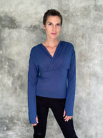 caraucci plant-based rayon stretch jersey navy blue long sleeve cross over neckline top #color_navy