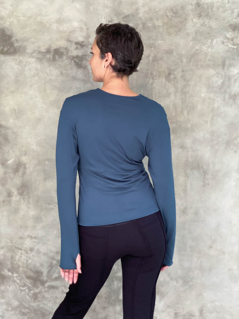 caraucci plant-based rayon stretch jersey teal blue long sleeve cross over neckline top #color_teal