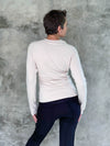 caraucci plant-based rayon stretch jersey cream long sleeve cross over neckline top #color_cream