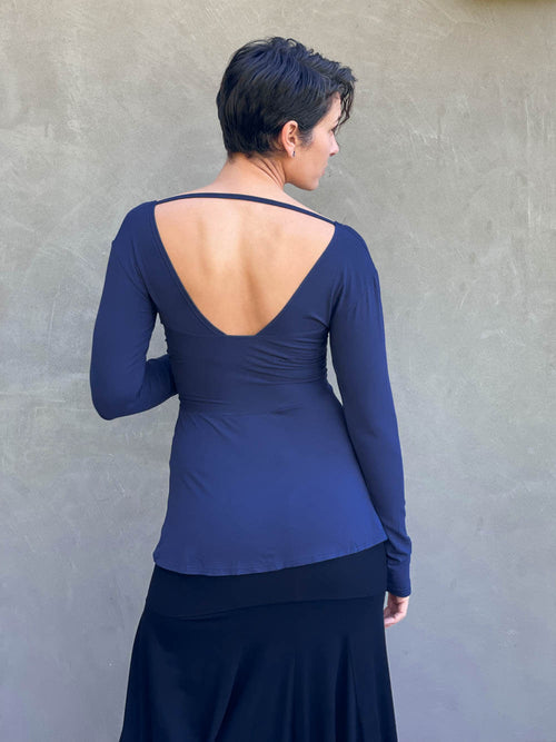 women's long sleeve plant-based rayon jersey navy blue top with deep twist v-neck #color_navy