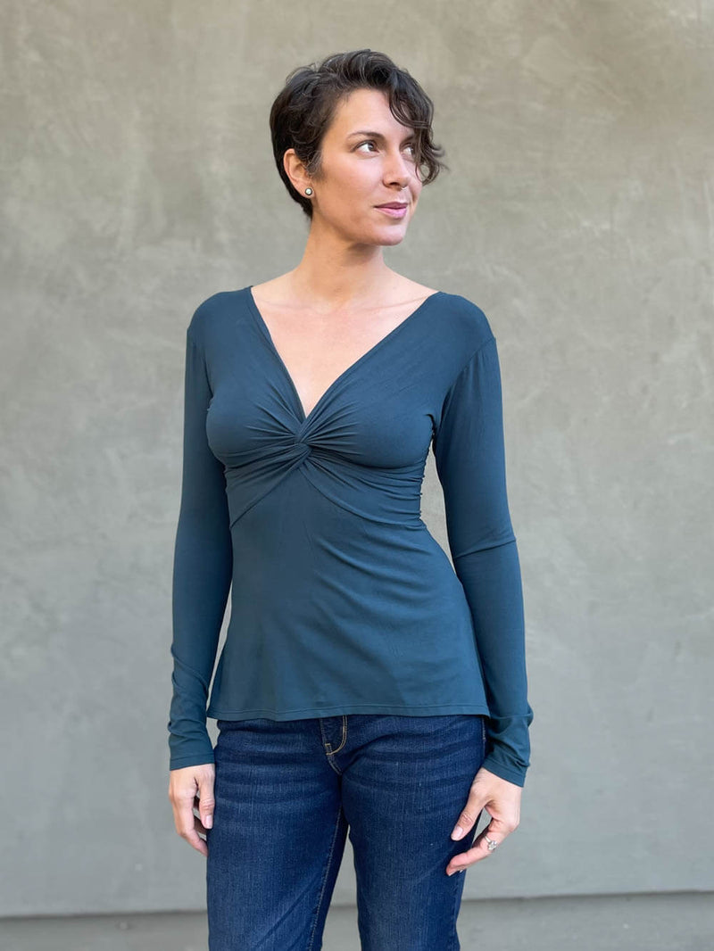 women's long sleeve plant-based rayon jersey teal blue top with deep twist v-neck #color_teal