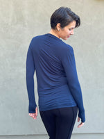 women's plant based rayon jersey lightweight long sleeve navy blue top with thumbholes #color_navy