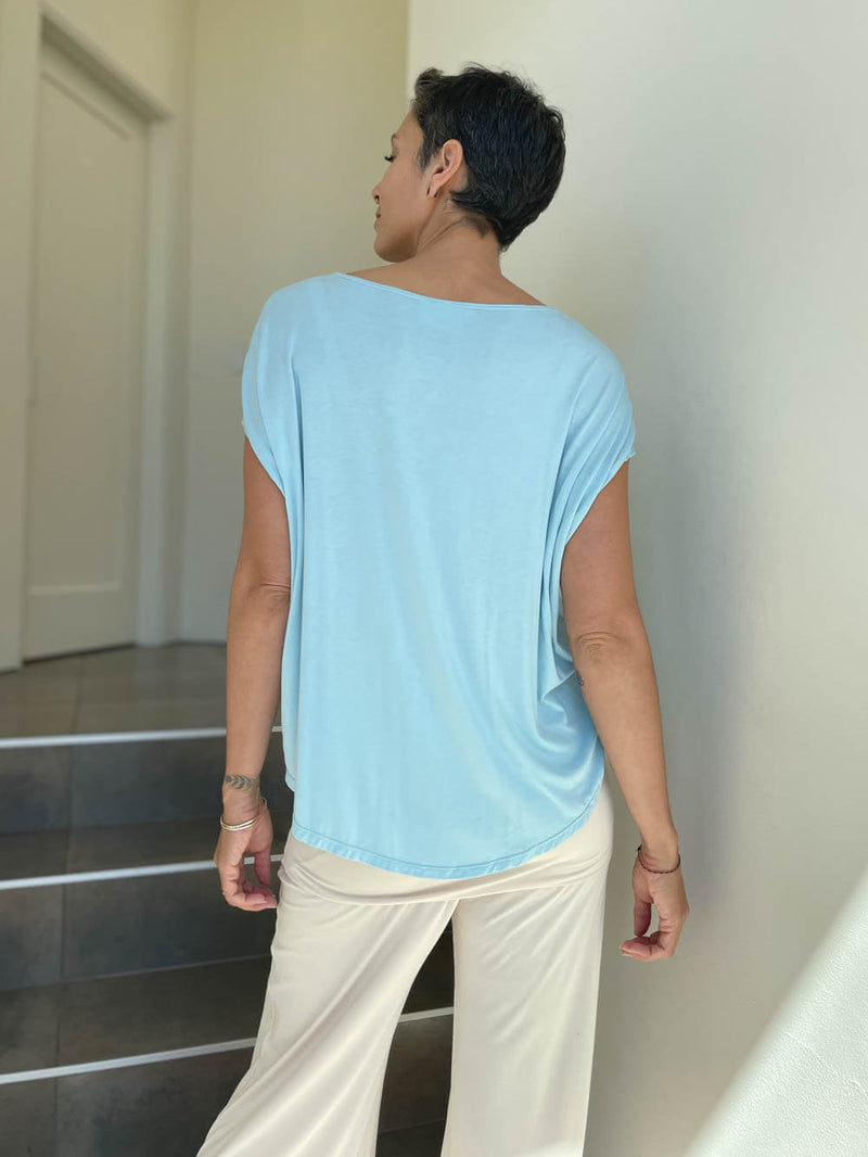 caraucci plant-based rayon jersey lightweight sky blue unstructured cap sleeve tee #color_canal-blue