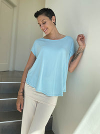 caraucci plant-based rayon jersey lightweight sky blue unstructured cap sleeve tee #color_canal-blue