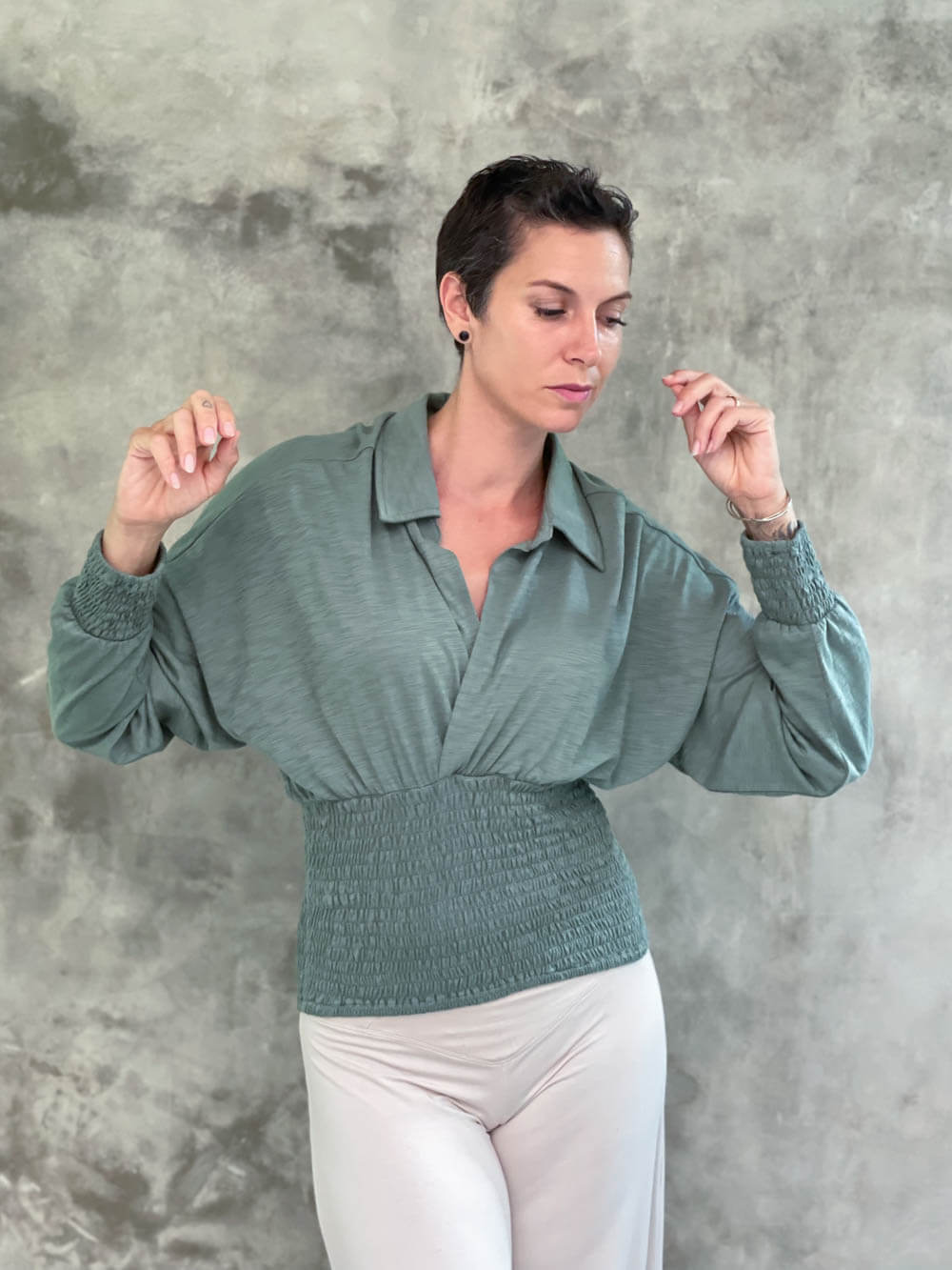 caraucci women's cotton slub sage green cotton slub v neck long sleeve dolman sleeve collared top with smocked waistband and cuffs #color_matcha