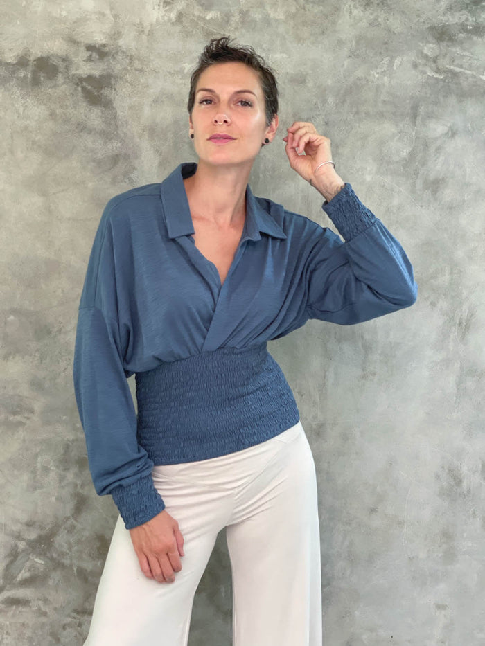 caraucci women's cotton slub sage green cotton slub v neck long sleeve dolman sleeve collared top with smocked waistband and cuffs #color_pacificcaraucci women's cotton dusty blue v neck long sleeve dolman sleeve collared top with smocked waistband and cuffs #color_pacific