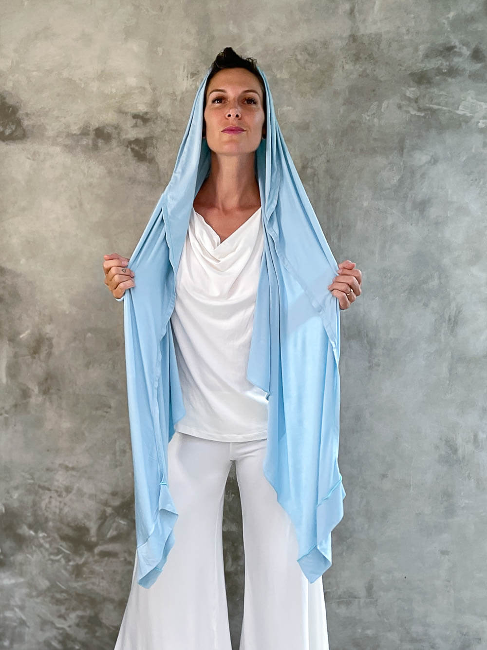 caraucci plant-based rayon jersey convertible sky blue wrap vest can be worn multiple way #color_canal-blue